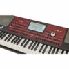 Clavier arrangeur Korg Pa700 rouge avec écran tactile et boutons de contrôle, idéal pour la composition musicale.